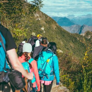 Hiking tourism - unsplash by Ashim D'Silva Photograph: Hikers climbing a mountain