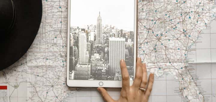 Photo: hat, ipad and map