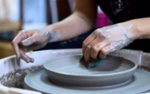 artist making clay