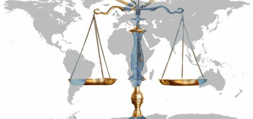 image of measuring scales in front of global map.